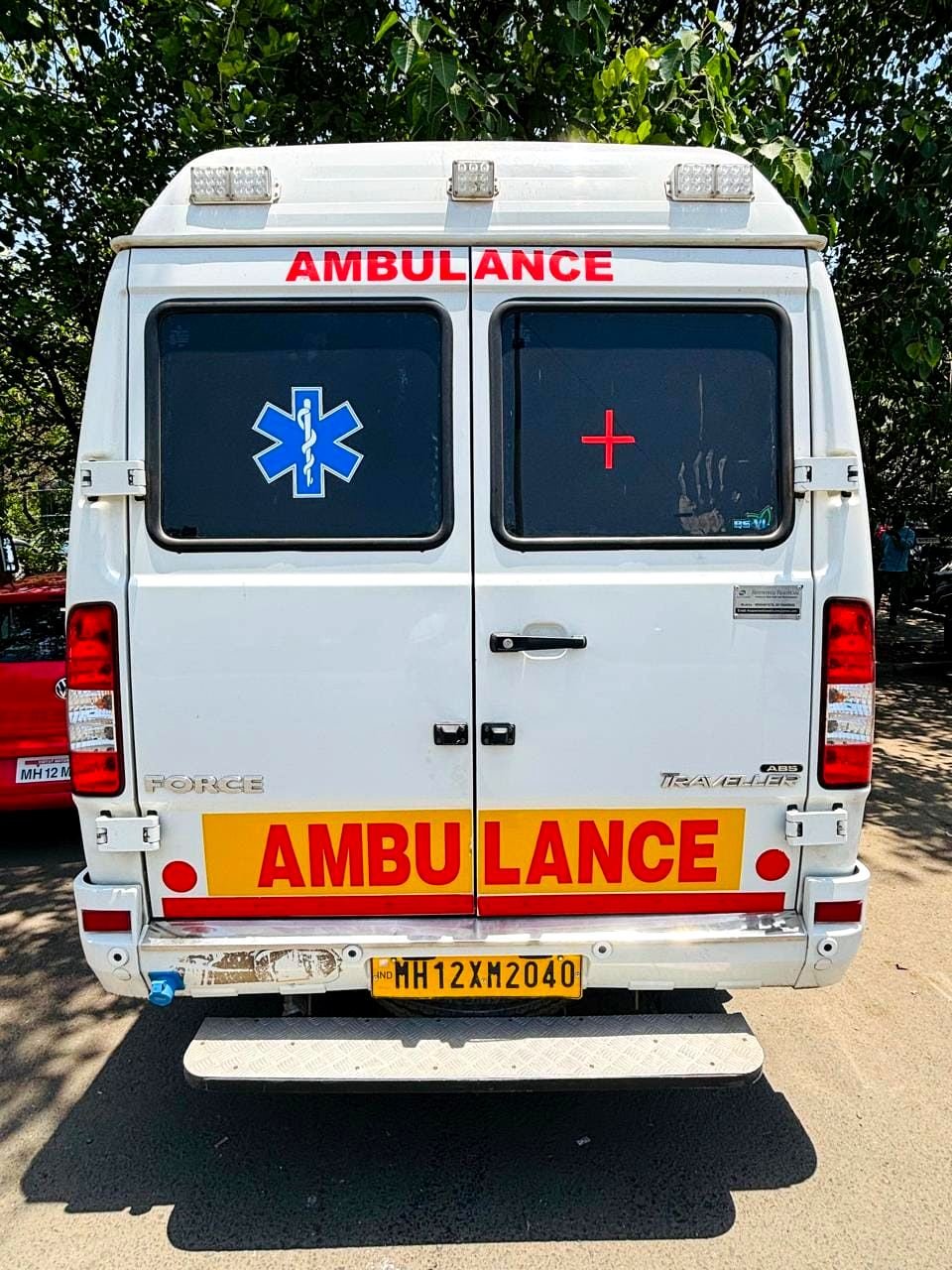 Ambulance rear view with signage